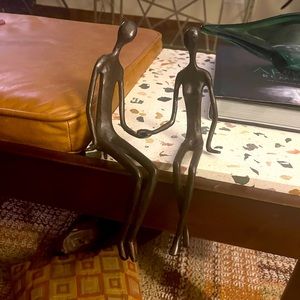 Two Lovers entwined. Sits on a shelf.